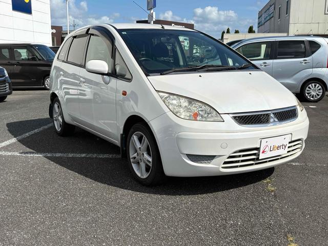 2009 Mitsubishi Colt Plus Cool Berry